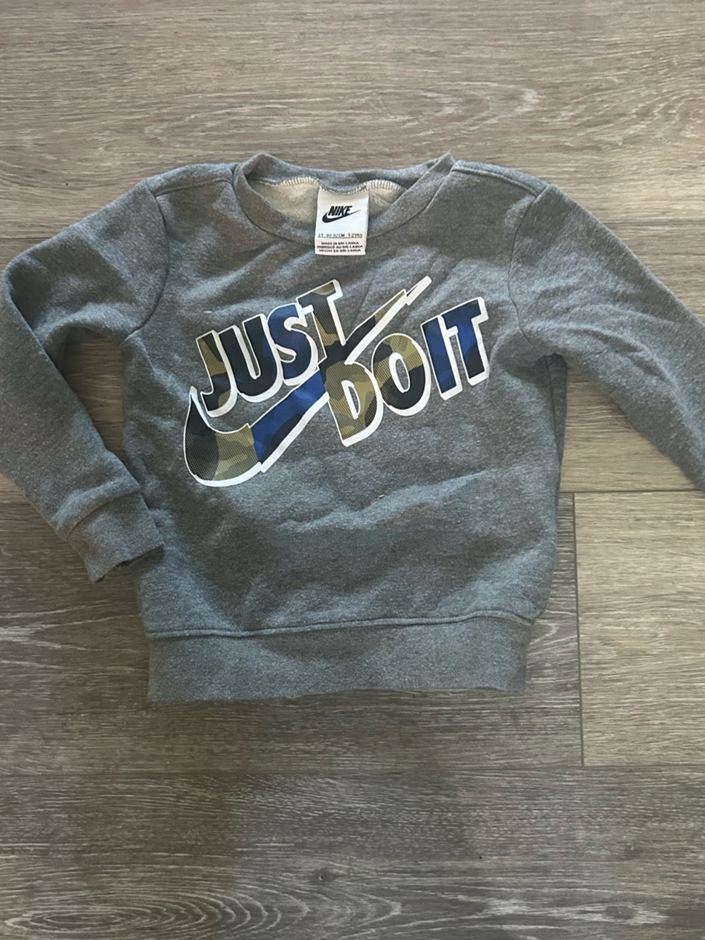 Nike Kids Gray Crewneck Sweatshirt with Blue & Camouflage 'Just Do It' Graphic